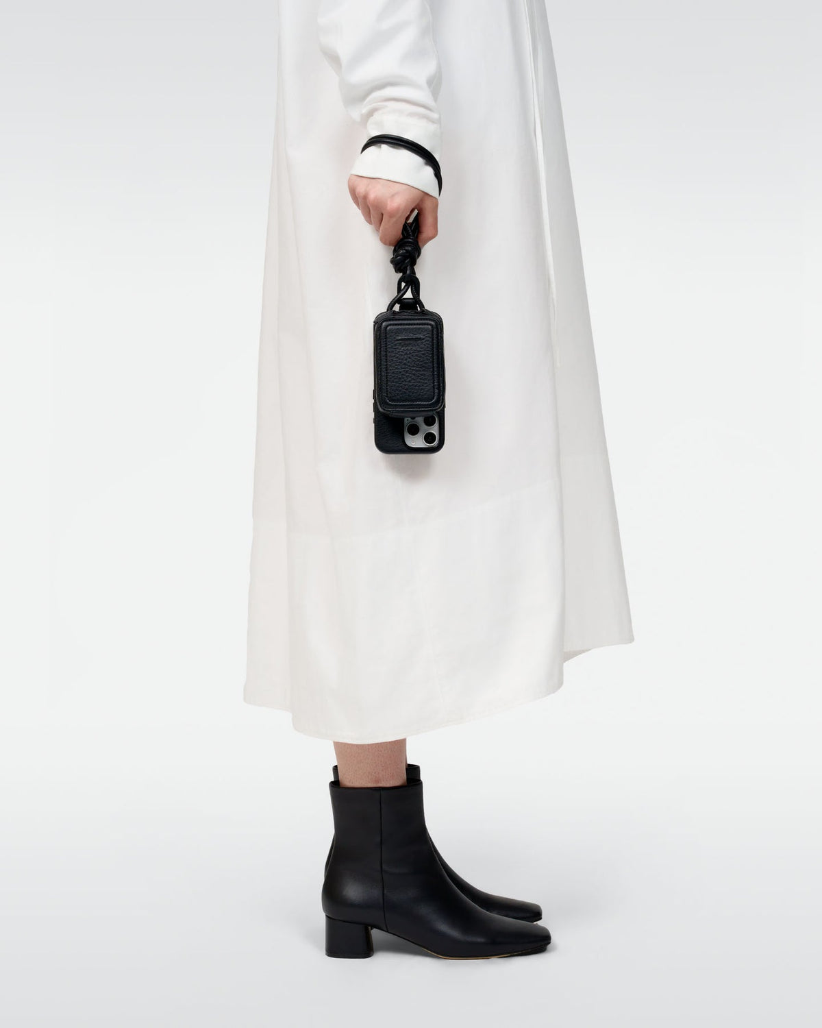 Black leather strap and MagSafe iPhone case set with micro bag, Japanese collection photography